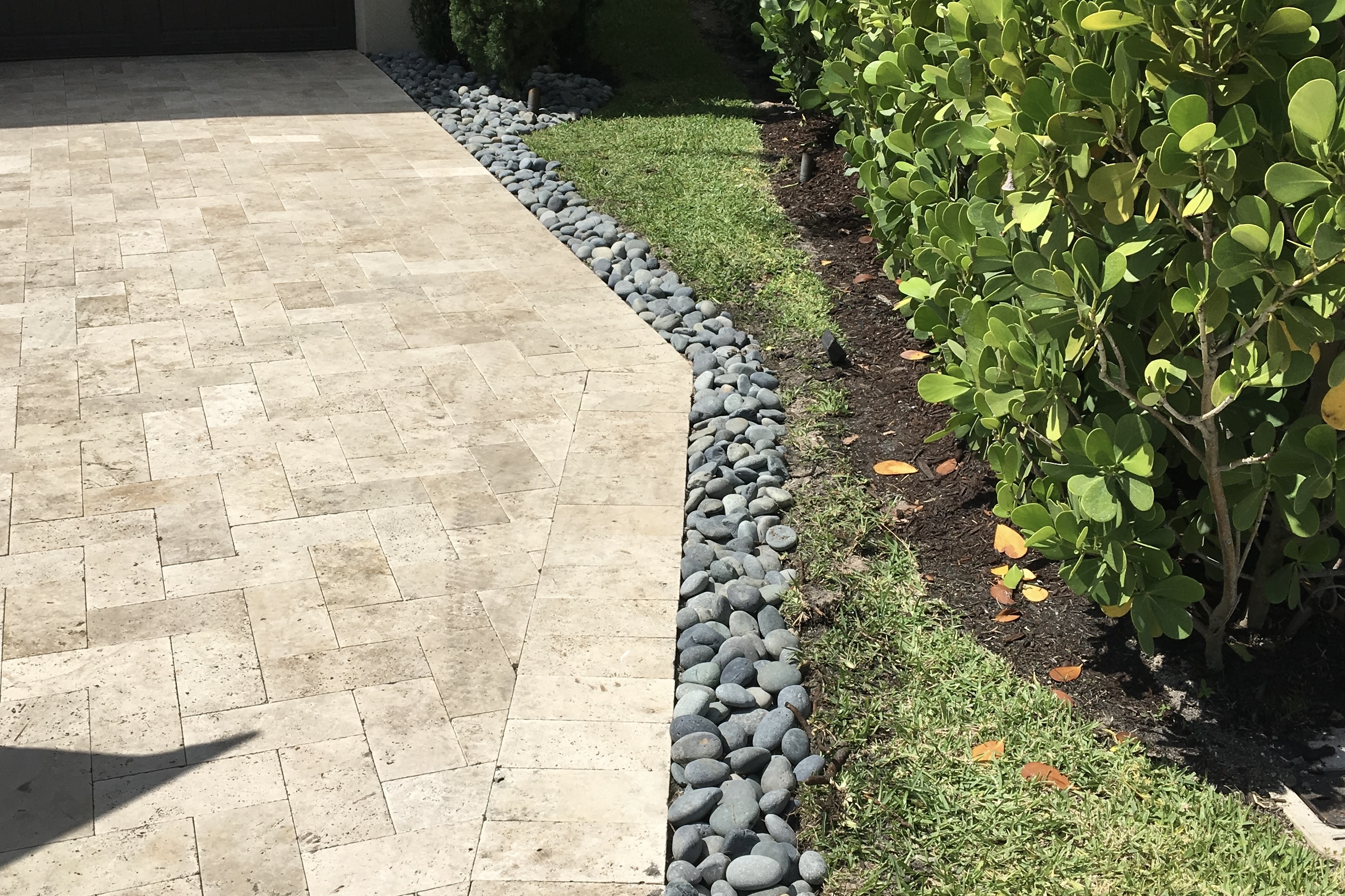 pavement next to grass